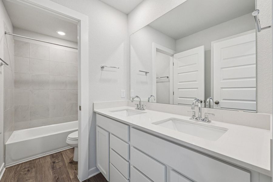 Furnished interior view inside a new home in Heights at San Gabriel, Georgetown (Image 13).