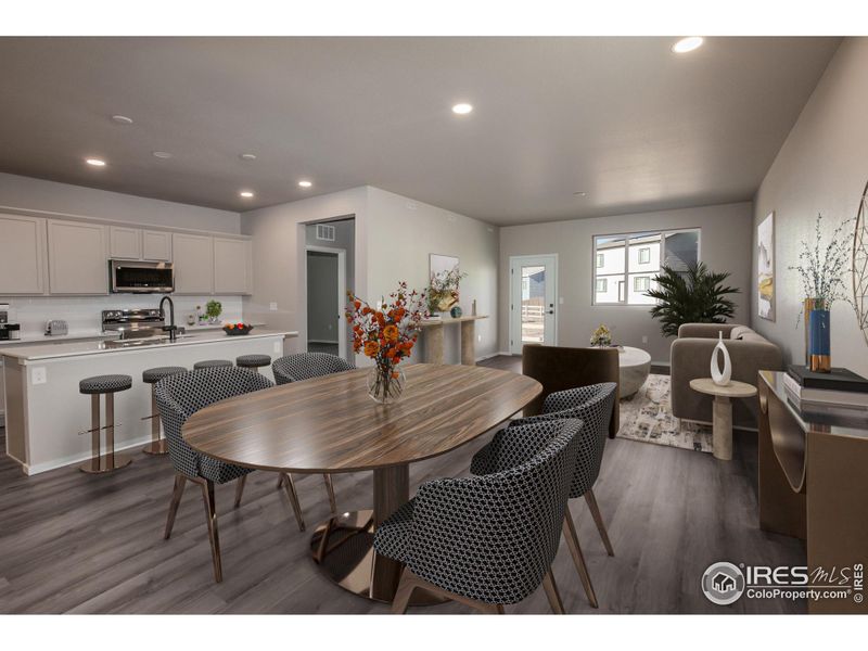 VIRTUALLY STAGED DINING, KITCHEN, AND LIVING ROOM