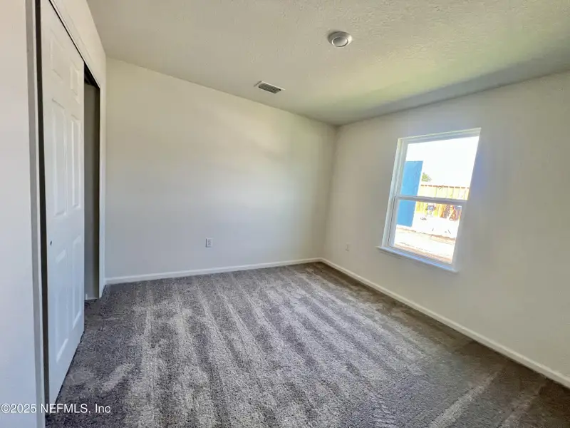 Spacious, unfurnished interior of a new home in Bellbrooke, Jacksonville (Image 5).
