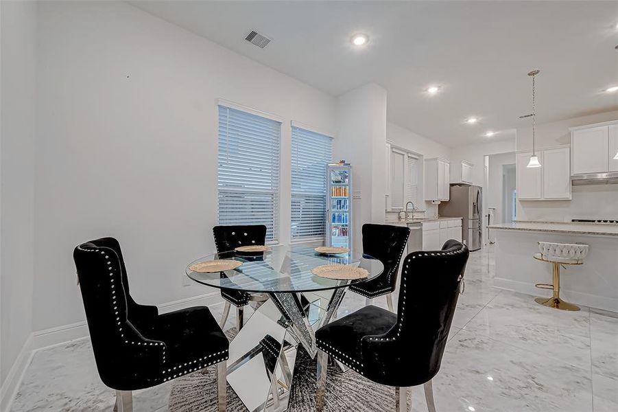 Bright Breakfast Area located off the kitchen