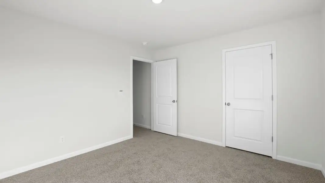 Spacious, unfurnished interior of a new home in Chestnut Ridge, Greenville (Image 26).