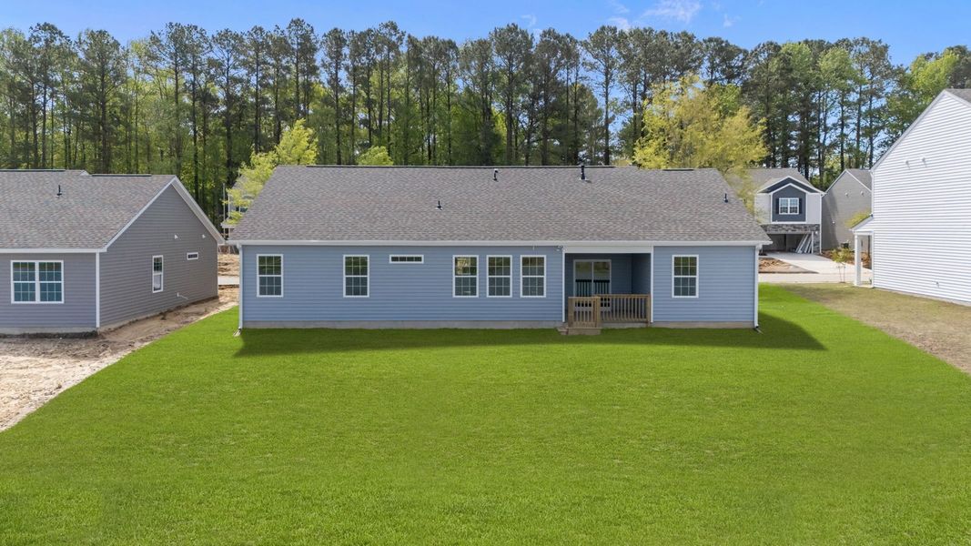 Exterior details and patio area of a home in Tyler - Home on the Lake, New Bern (Image 23).