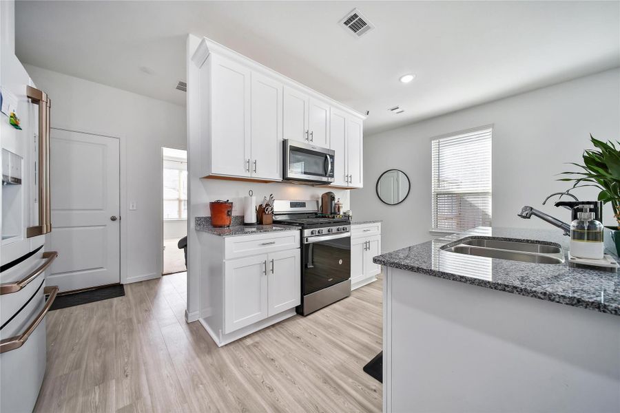 Furnished interior view inside a new home in , Cypress (Image 25).