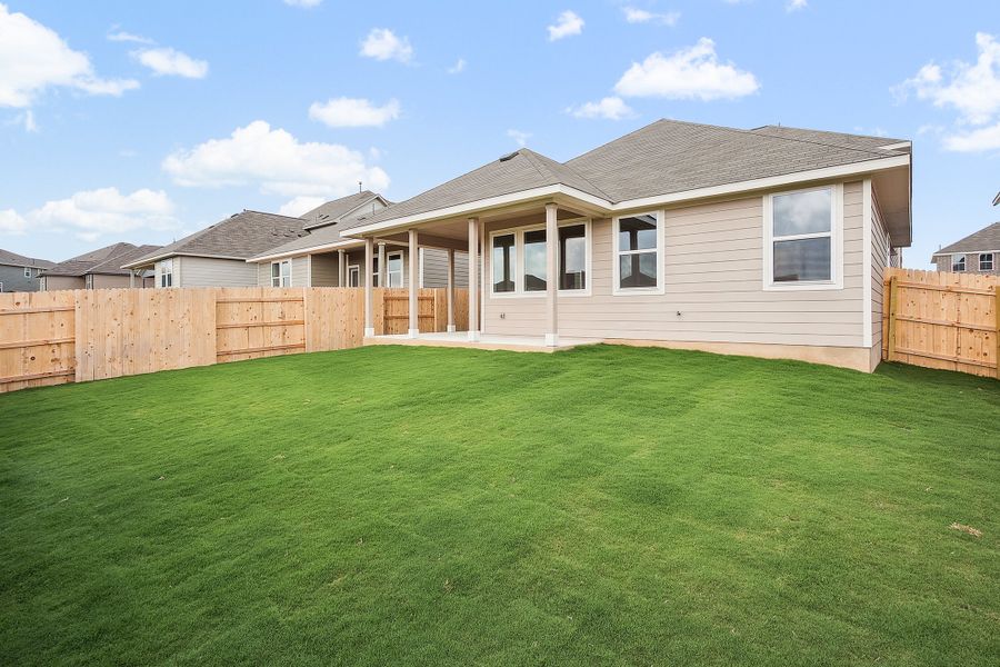 Representative exterior photo of a completed home built from the Blake by Ashton Woods in Rolling Glen, Hutto, TX (Image 29).