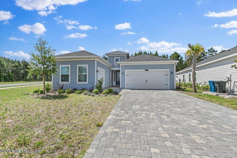 Front exterior of a new home in , St. Augustine, FL, highlighting curb appeal (Image 17).