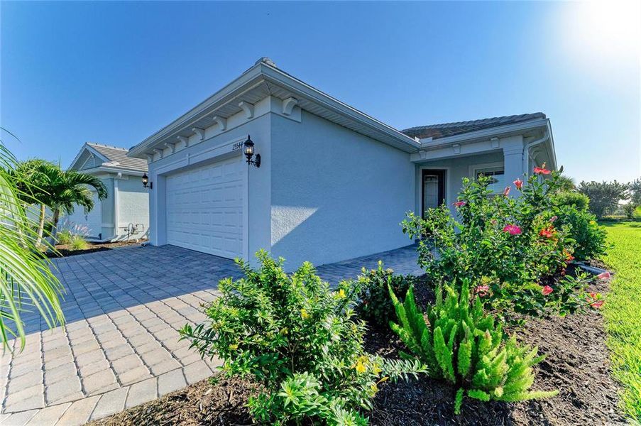 Exterior details and patio area of a home in BeachWalk by Manasota Key, Englewood (Image 2). Exterior details and patio area of a home in BeachWalk by Manasota Key, Englewood (Image 2).