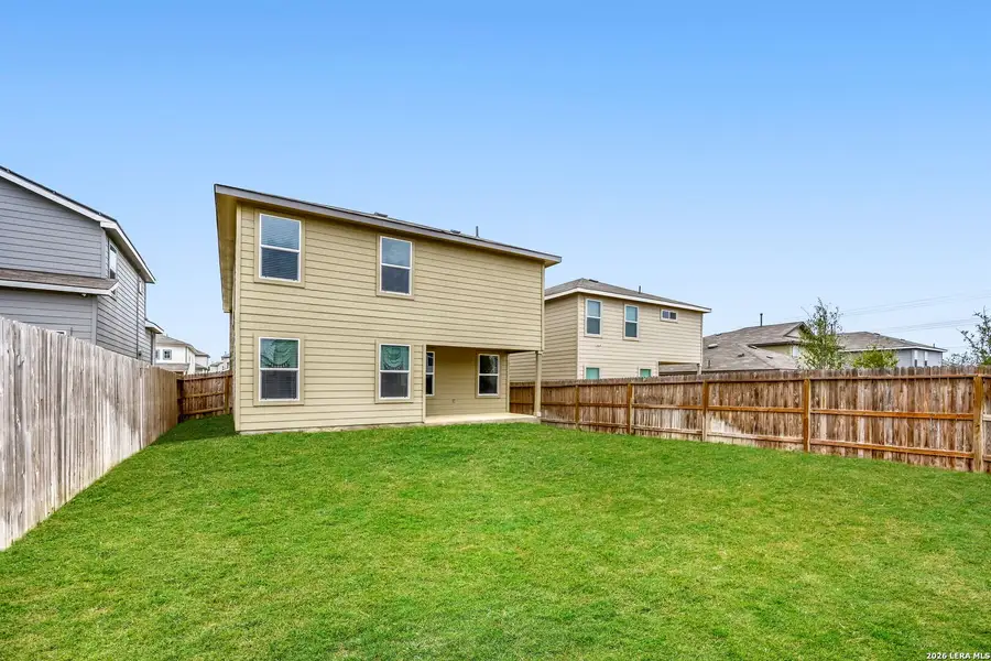 Exterior details and patio area of a home in Redbird Ranch, San Antonio (Image 23).