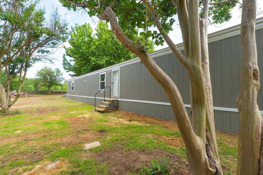 Exterior details and patio area of a home in , Gordonville (Image 14).