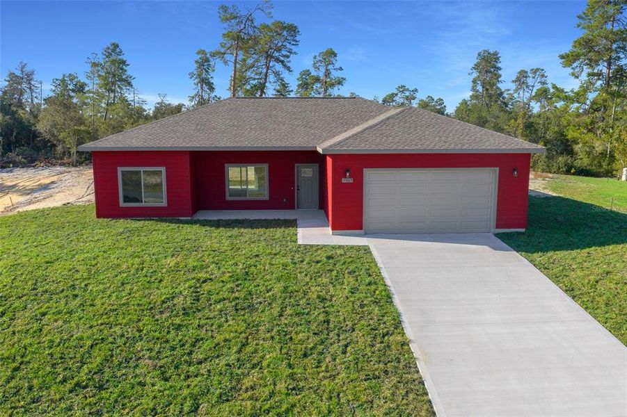Front exterior of a new home in , Ocala, FL, highlighting curb appeal (Image 2).