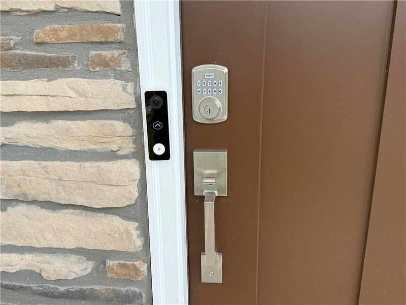 Secure entry features a smart lock and video doorb Secure entry features a smart lock and video doorb