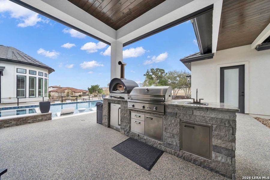 Exterior details and patio area of a home in , New Braunfels (Image 26).