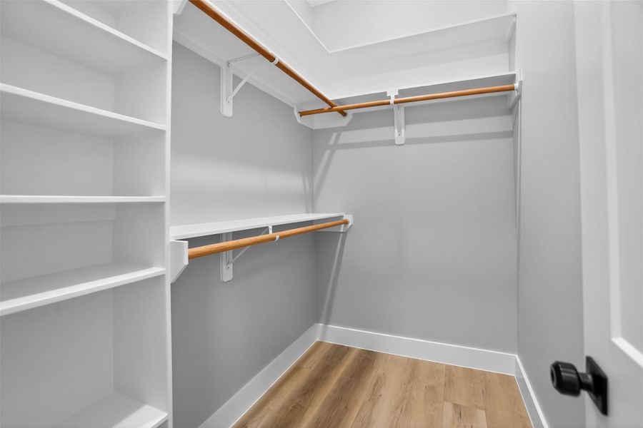 Each of the secondary bedrooms contains large walk-in closets with built-in storage
