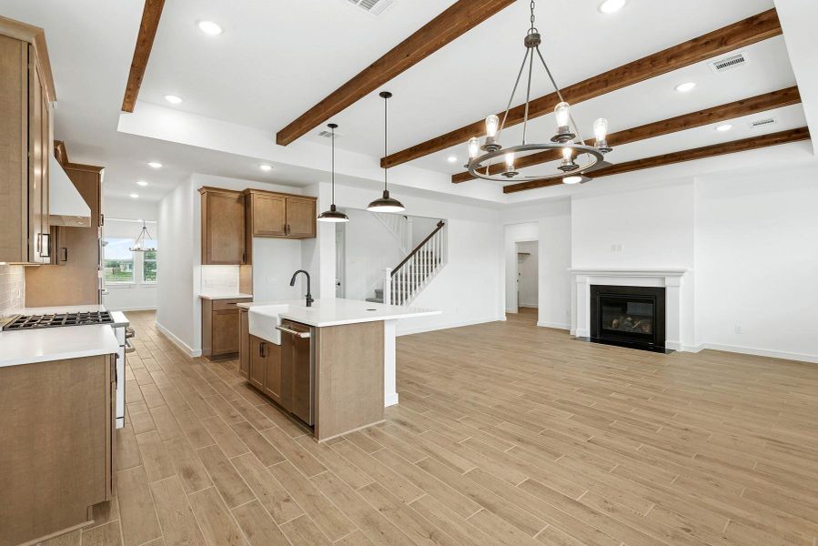 Open great room with cozy fireplace (*Photo not of actual home and used for illustration purposes only.) Open great room with cozy fireplace (*Photo not of actual home and used for illustration purposes only.)