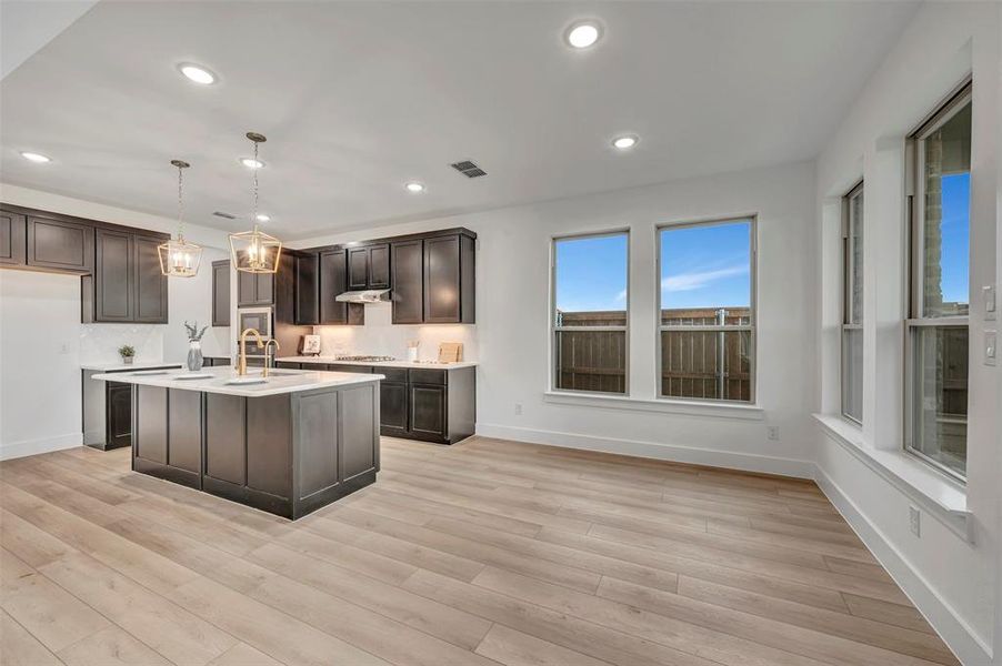 Furnished interior view inside a new home in Lily Creek at Sutton Fields, Aubrey (Image 12).