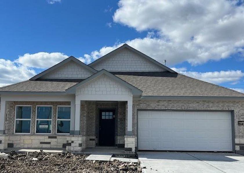 Front exterior of a new home in , Angleton, TX, highlighting curb appeal (Image 1). Front exterior of a new home in , Angleton, TX, highlighting curb appeal (Image 1).