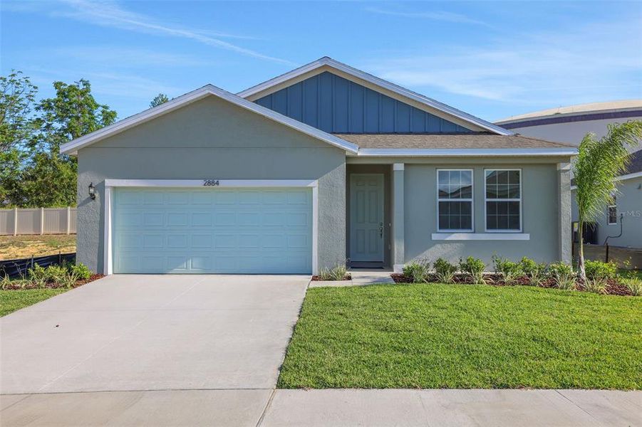 Front exterior of a new home in Cypress Park Estates, Haines City, FL, highlighting curb appeal (Image 1). Front exterior of a new home in Cypress Park Estates, Haines City, FL, highlighting curb appeal (Image 1).