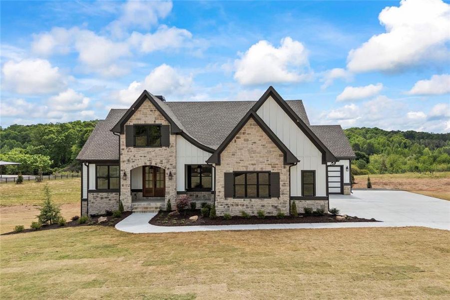 Front exterior of a new home in , Monroe, GA, highlighting curb appeal (Image 32).