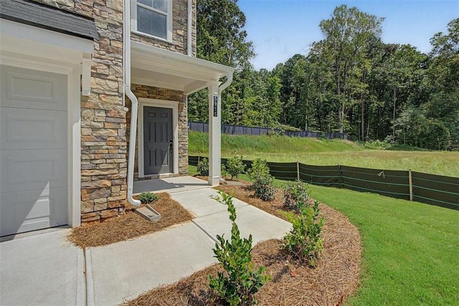 Exterior details and patio area of a home in Sawmill Creek, Mableton (Image 28).