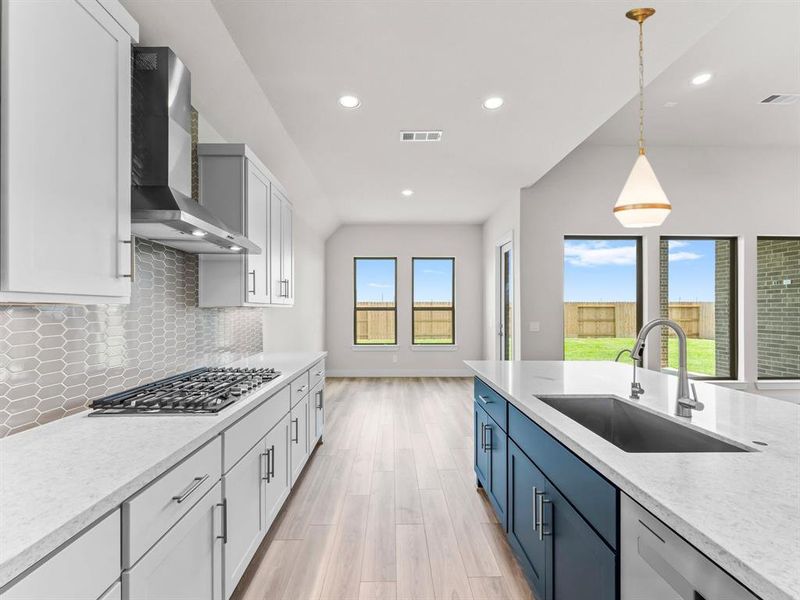 Cabinet Hardware, Soft Close Kitchen Doors, and Upgraded Chimney Hood.