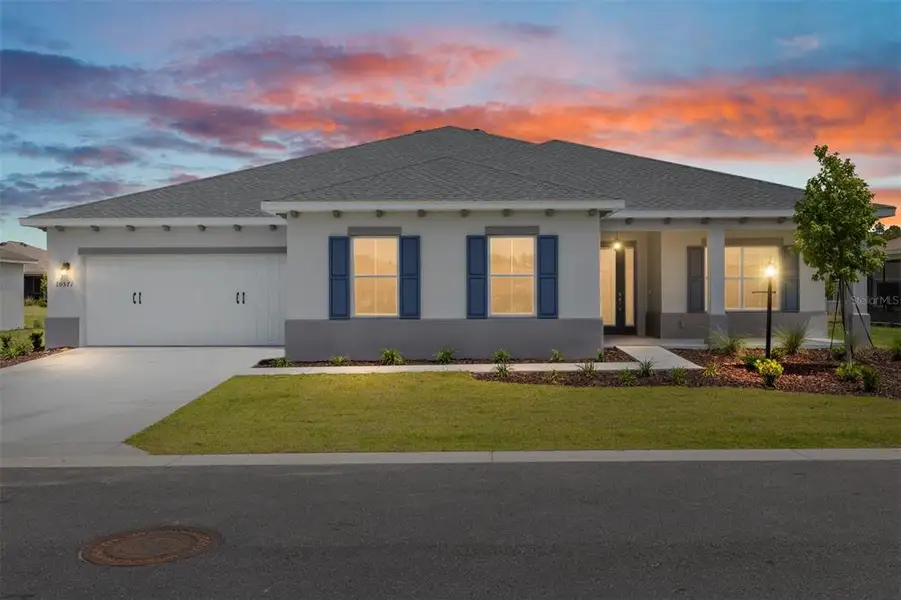 Front exterior of a new home in , Ocala, FL, highlighting curb appeal (Image 1). Front exterior of a new home in , Ocala, FL, highlighting curb appeal (Image 1).