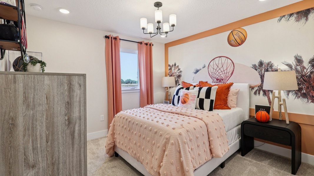 The Mangrove Second Floor Bedroom at Lakeside at Satilla by DRB Homes in Saint Cloud, FL