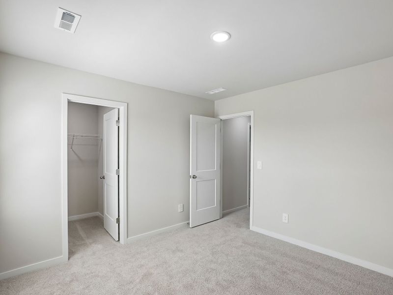 Spacious, unfurnished interior of a new home in Marshburn Landing - Bungalow Series, Wendell (Image 21).