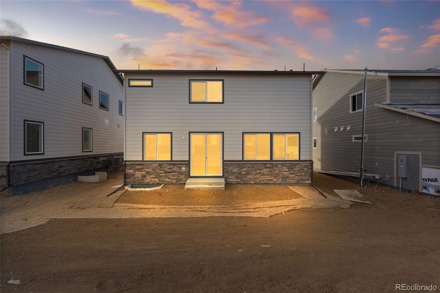 Exterior details and patio area of a home in Harvest Crossing, Aurora (Image 3).