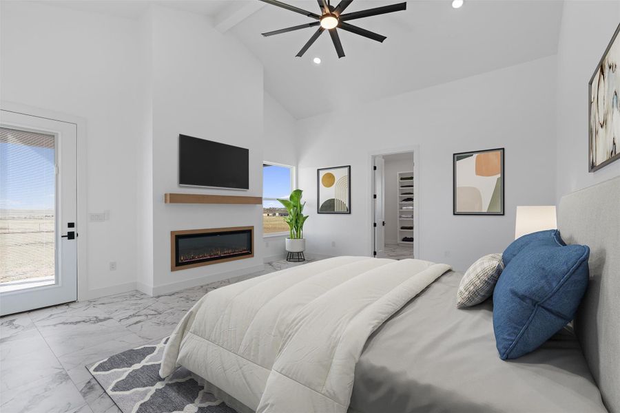 Bedroom featuring marble look tiles, high vaulted ceiling, a glass covered fireplace, beam ceiling, and ceiling fan. Virtual staging used