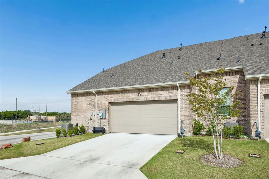 Front exterior of a new home in , Grand Prairie, TX, highlighting curb appeal (Image 19).