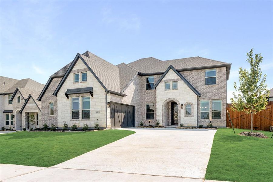 Front exterior of a new home in Ridgepoint, Midlothian, TX, highlighting curb appeal (Image 1).