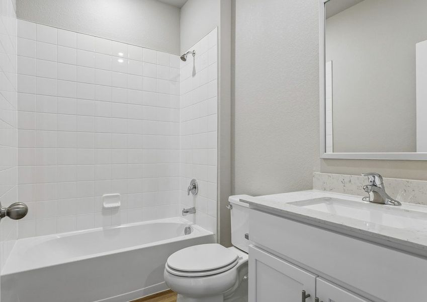 The secondary bathroom has a tub/shower combo.