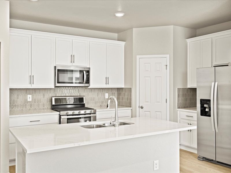 The Keystone floorplan interior image taken at a Meritage Homes community in Aurora, CO.