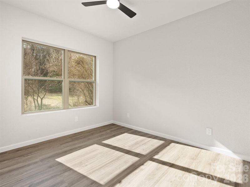 Spacious, unfurnished interior of a new home in , Waynesville (Image 29).