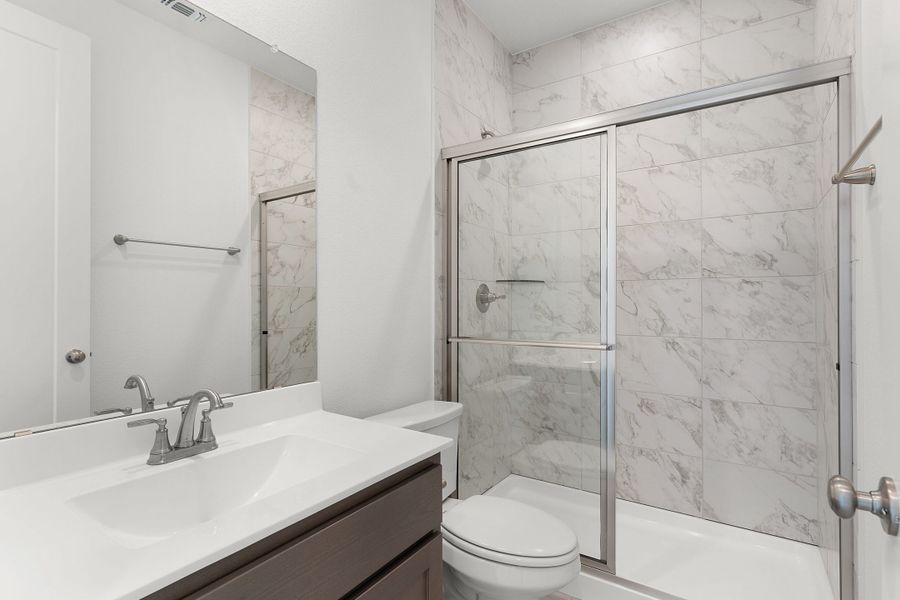 Representative furnished interior of a home built from the Ludo by Chesmar Homes in Deerbrooke Cottages, Leander (Image 6). Representative furnished interior of a home built from the Ludo by Chesmar Homes in Deerbrooke Cottages, Leander (Image 6).