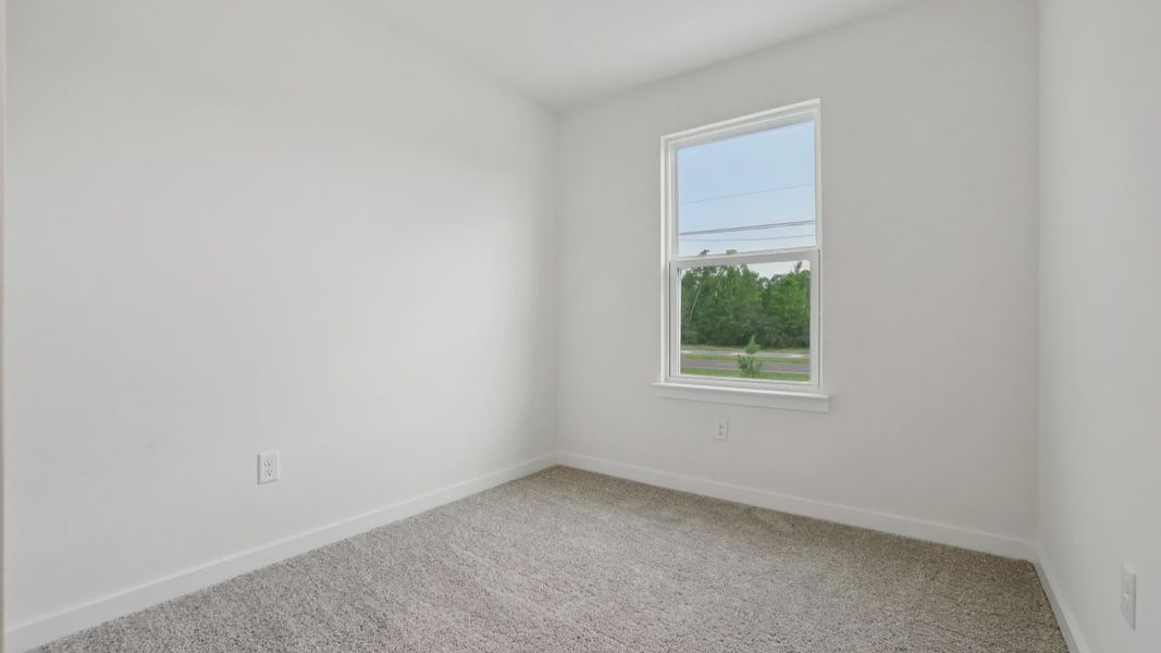 Fourth Bedrooom of the Coronado - End at Cyrene at Harmony located in St Cloud FL by DRB Homes