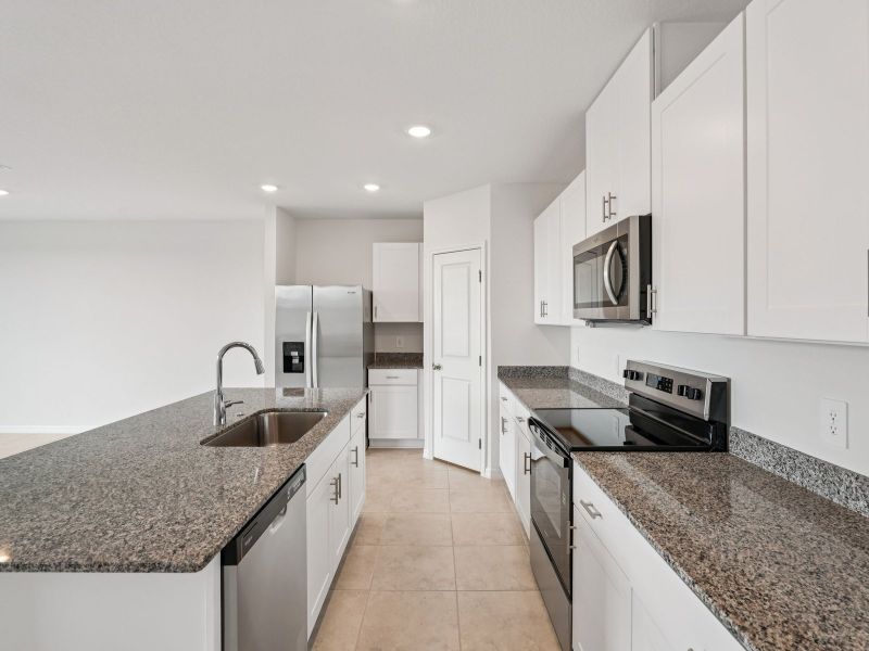 Furnished interior view inside a new home in Springs at Lake Alfred - Signature Series, Lake Alfred (Image 3).