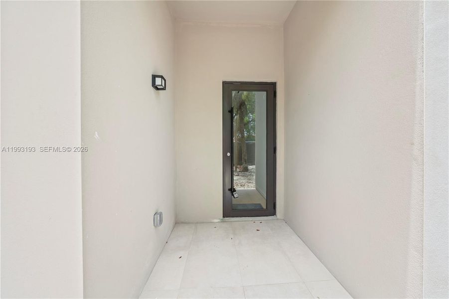 Exterior details and patio area of a home in , Miami (Image 4). Exterior details and patio area of a home in , Miami (Image 4).