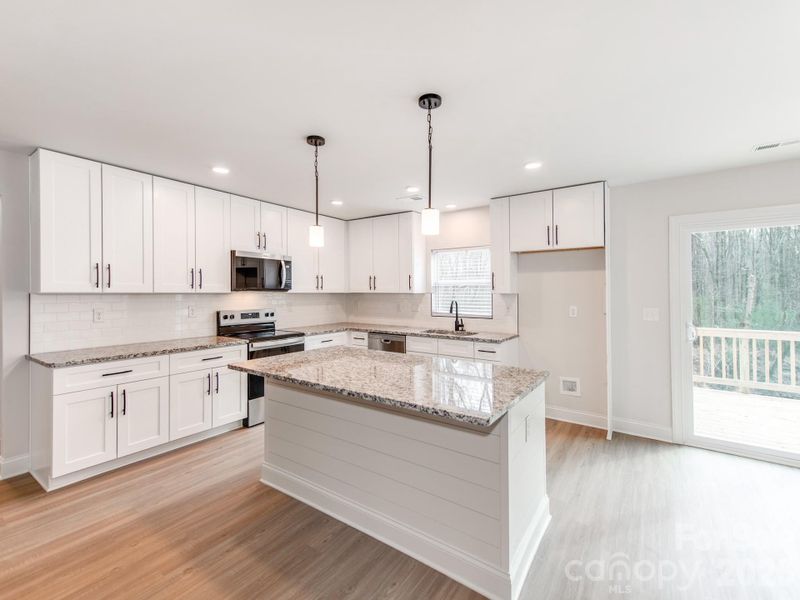 Furnished interior view inside a new home in , Monroe (Image 8).