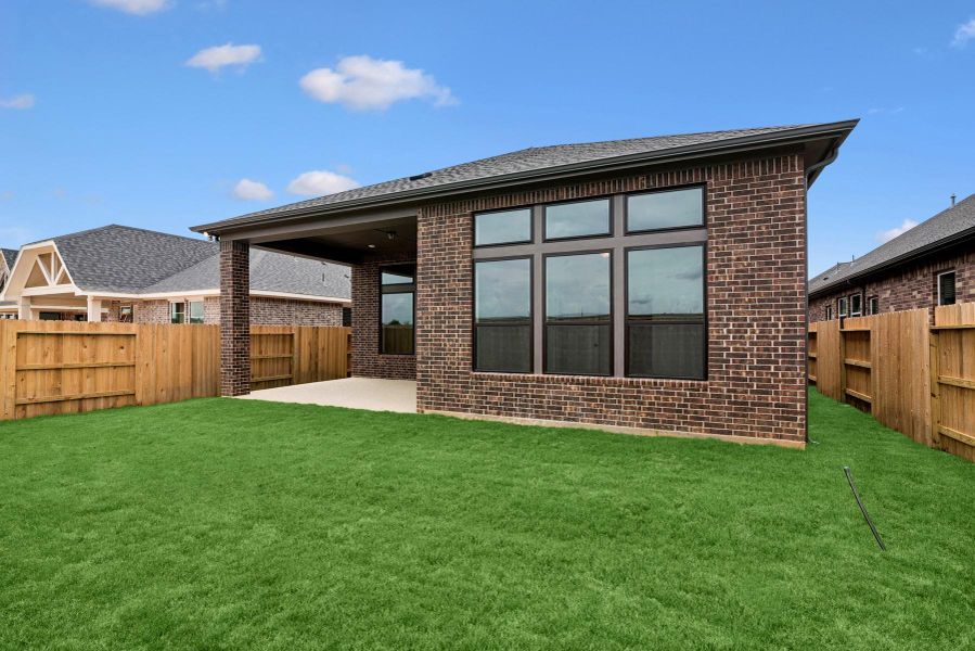 Exterior details and patio area of a home in Grange - Reserve Collection, Katy (Image 24).