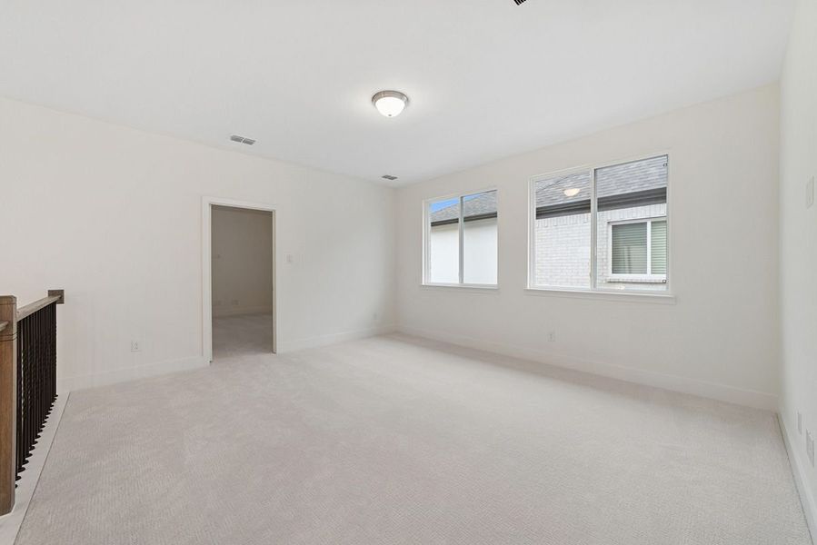 Representative furnished interior of a home built from the Riseley by Landon Homes in Fields - East Village, Frisco (Image 27).