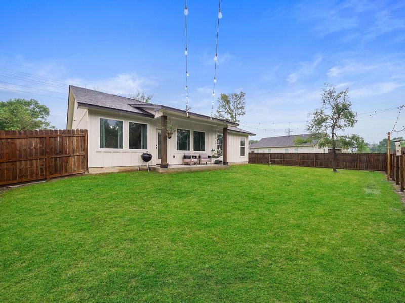 THE PERFECT SIZE BACK YARD WITH NO NEIGHBORS BEHIND YOU.