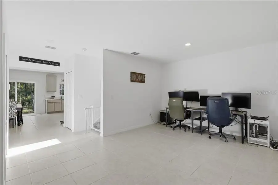 Furnished interior view inside a new home in Flagler Estates, Hastings (Image 7).