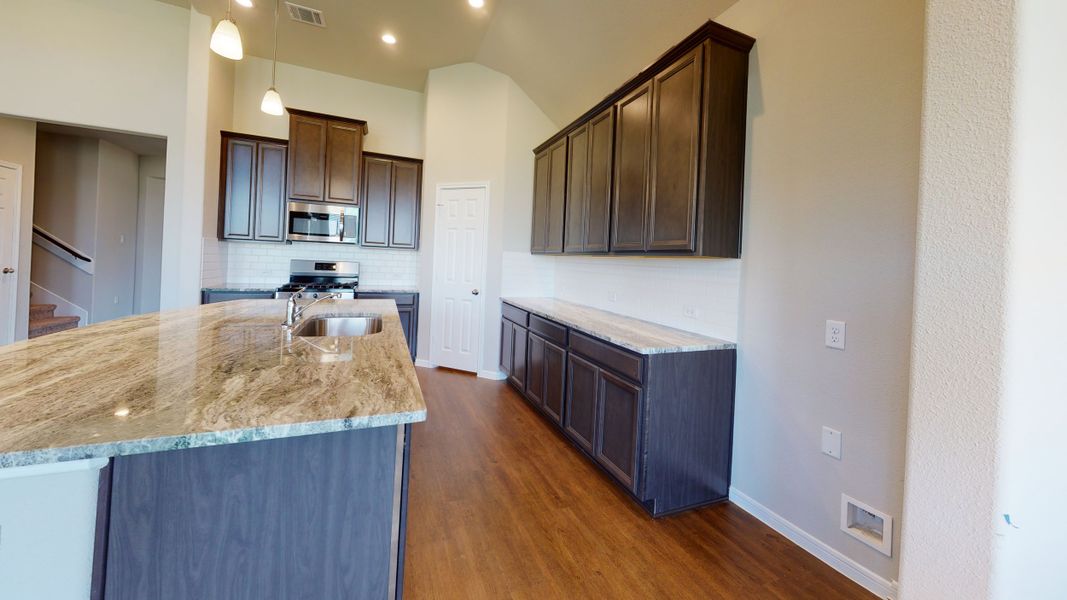 Representative furnished interior of a home built from the Floor Plan 3256 by Colina Homes in Grand Magnolia, Magnolia (Image 35).
