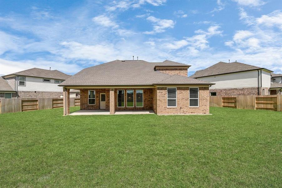 Backyard retreat, offering an abundance of space for kids to play and explore. The possibilities are endless in this outdoor haven, where the joy of open-air activities and family gatherings awaits.