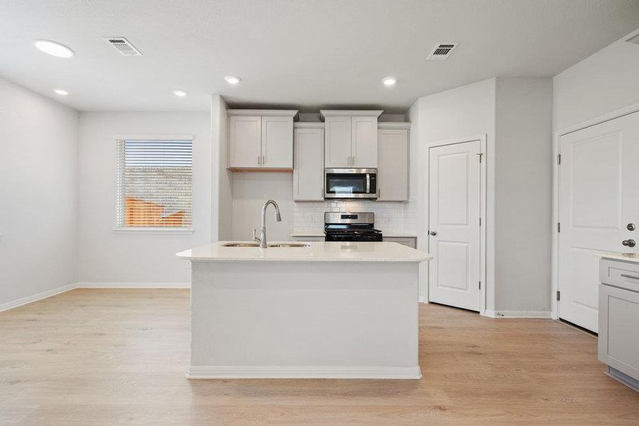 Photo of similar home. Actual home under construction.