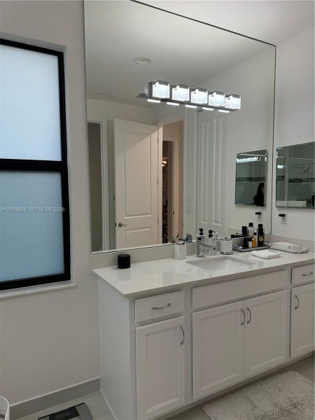 Furnished interior view inside a new home in , Port St. Lucie (Image 35).