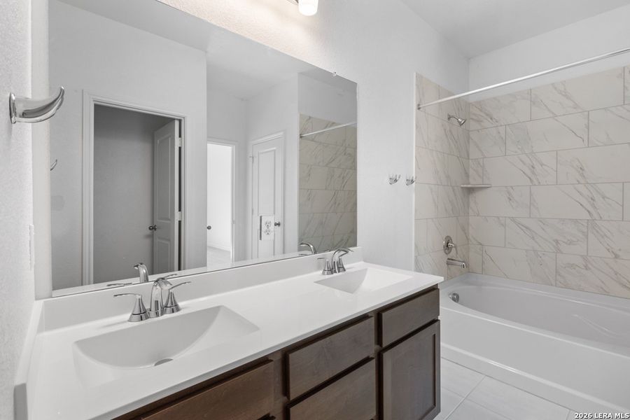 Furnished interior view inside a new home in Hidden Bluffs at TRP, San Antonio (Image 6).