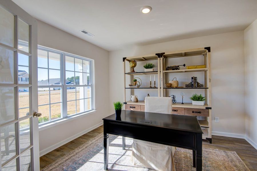 Representative furnished interior of a home built from the Penwell by D.R. Horton in Carter Ridge, Greenville (Image 8).