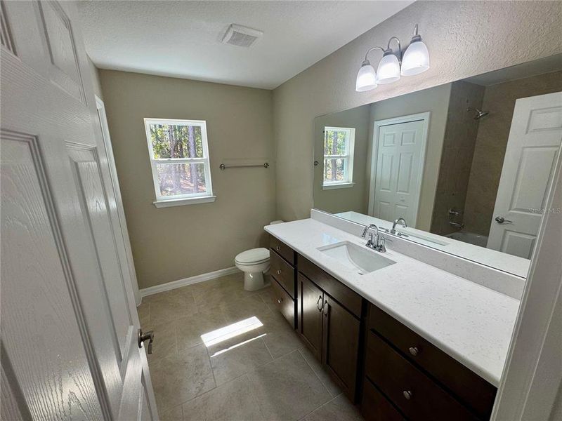 Furnished interior view inside a new home in , Dunnellon (Image 8).