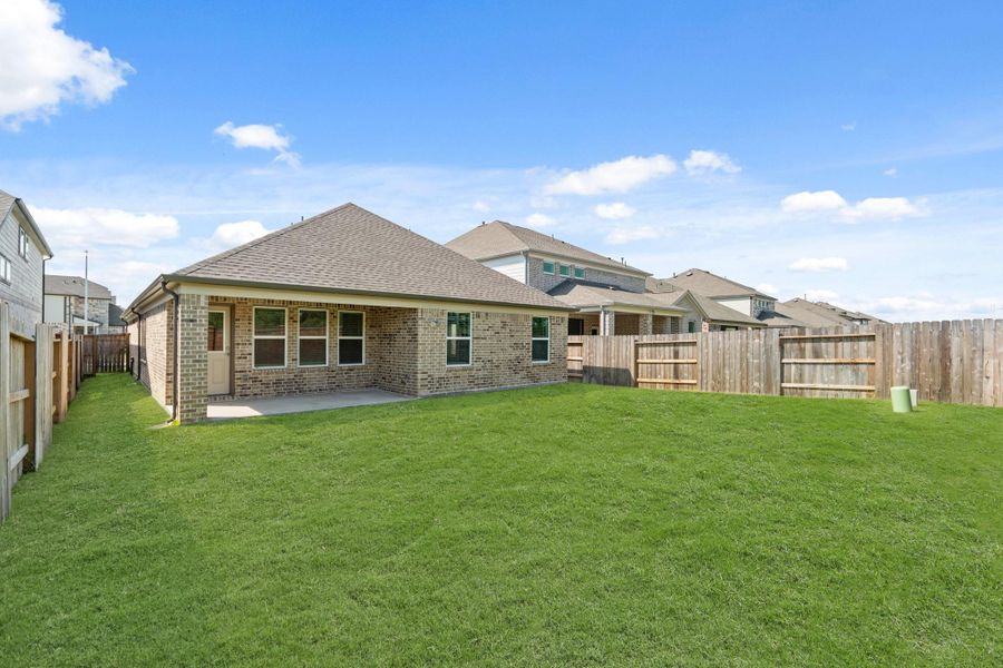 Exterior details and patio area of a home in Sunterra North, Katy (Image 14). Exterior details and patio area of a home in Sunterra North, Katy (Image 14).
